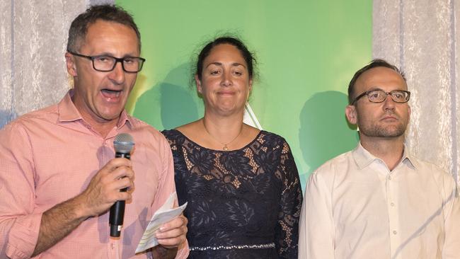 Greens leader Richard Di Natale, Alex Bhathal and Adam Bandt concede defeat in Batman on Saturday night.