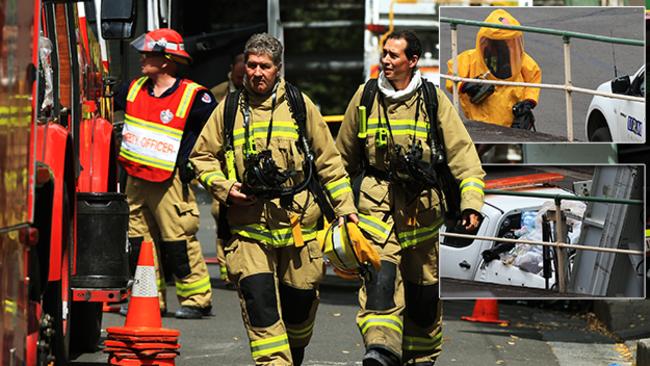 A garbage truck driver was overcome by fumes coming from the back of his truck while driving down Sirius Cove Rd in Mosman. Police, fire and ambulance personnel attended the scene, closing down the street while they found the source of the incident. Picture: Toby Zerna