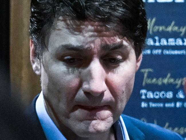 Canadian Prime Minister Justin Trudeau leaves the hotel for the airport, in West Palm Beach, Florida, on November 30, 2024. Canadian Prime Minister Justin Trudeau arrived in Florida on November 29 for a dinner with Donald Trump at the president-elect's Mar-a-Lago estate, as the incoming US leader promised tariffs on Canadian imports. The unannounced meeting comes at the end of a week that has seen Canada as well as Mexico scramble to blunt the impact of Trump's trade threats, which experts have warned could also hit US consumers hard. (Photo by CHANDAN KHANNA / AFP)