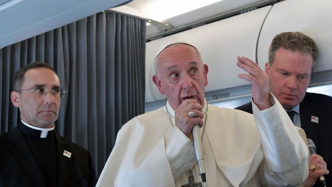 Pope Francis addresses journalists during the traditional press conference on his flight back to Rome following a two-day visit at Fatima in Portugal, on May 13. Picture: AFP