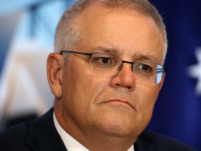 SYDNEY, AUSTRALIA - NewsWire Photos APRIL 22, 2021 - Prime Minister Scott Morrison listens to President BidenÃs virtual address from the Sydney Commonwealth Parliament Offices.Picture: NCA NewsWire / Christian Gilles