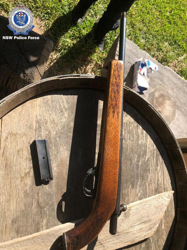 Multiple loaded rifles were seized by police