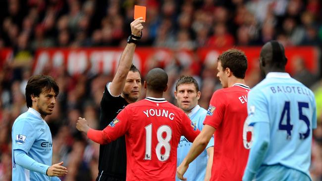 Referee Mark Clattenburg sends off Manchester United’s Jonny Evans during a Premier League match in 2011. Picture: Laurence Griffiths/Getty Images