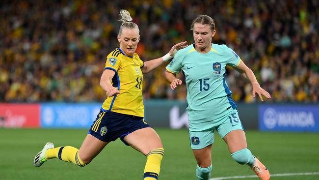 Stina Blackstenius of Sweden shoots under pressure from Clare Hunt of Australia during the FIFA Women's World Cup Australia &amp; New Zealand 2023 Third Place match between Sweden and Australia at Brisbane Stadium. Picture: Getty