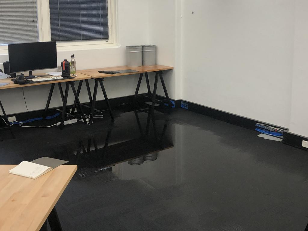 A flooded office in Sydney's CBD this morning. Picture: Supplied