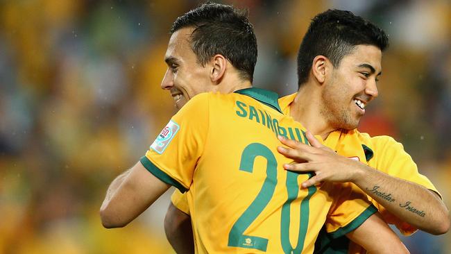 Trent Sainsbury and Massimo Luongo celebrate another big win for Australia.