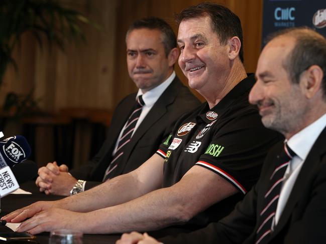 Ross Lyon was all smiles flanked by Simon Lethlean and president Andrew Bassat. Picture: Michael Klein