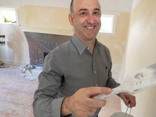 Frank Triantafyllou has tackled a dozen home updates across his own properties and investments. And he's reliably found the easiest way to add value is a simple lick of fresh paint. Solar panels, squeezing an extra bedroom into a floorplan, a replacement kitchen bench and new bathroom tiling could be enough to add $100,000 to the value of Melbourne's dated and daggy homes. Picture: Tony Gough