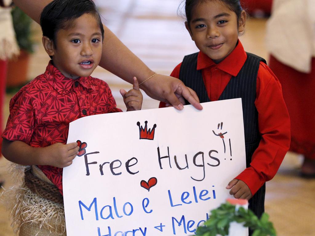 I would pay those children $900 for a hug. Don’t devalue yourself, kids. Picture: Phil Nobel/AP