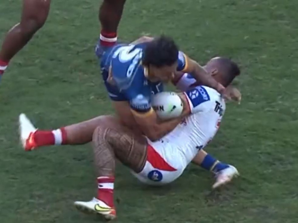 Haze Dunster’s knee buckles under the weight of Tyrell Fuimaono.