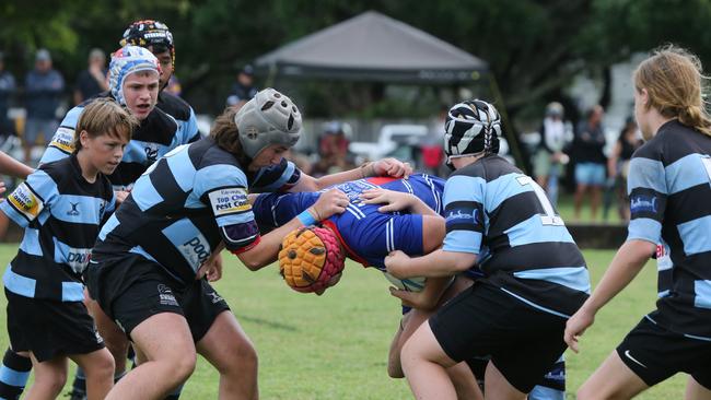 Day 1 of the King of the Country junior rugby union tournament at the Gold Coast Eagles Rugby Union Club.Maroochydore Swans (BLUE AND BLACK) vs USQ Saints (Blue ) Maroochydore Player No USQ Player No Pic Mike Batterham