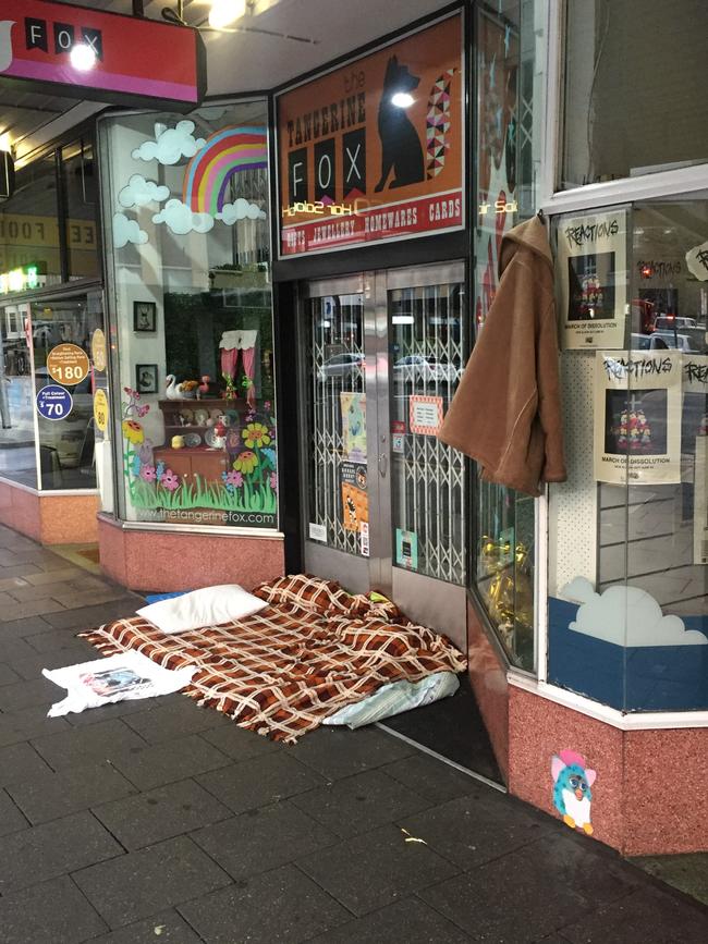 Rough sleepers camped outside shopfronts on Pulteney St, Adelaide.