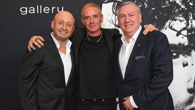 Vincent Fantauzzo (middle) with Larry Kestelman (left) and Eddie McGuire (right) at the gallery opening. Picture: Tony Gough