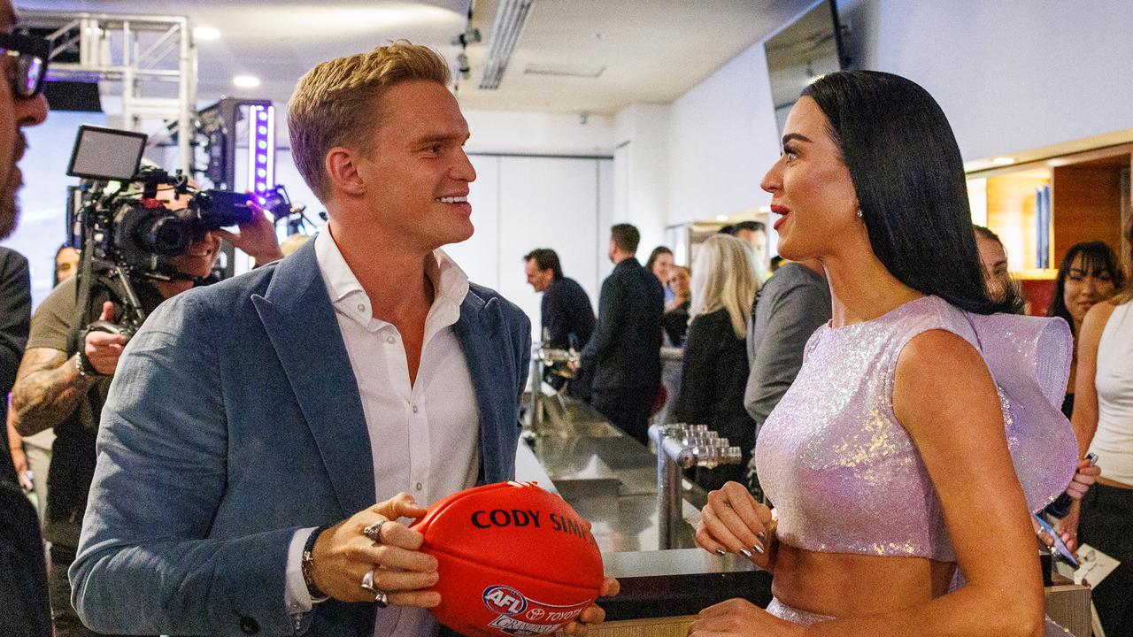 Cody Simpson and Katy Perry swap stories ahead of the AFL grand final. Picture: NewsWire/Nadir Kinani