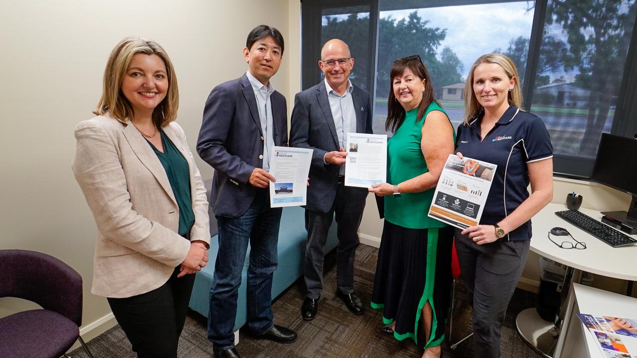 Isaac NaviCare consult room and telehealth facility at the Moranbah Youth and Community Centre (L-R) Dr Claudia Giurgiuman – CEO Wesley Medical Research; Taro Abe – Senior Vice President and Head of Metallurgical Coal Division, Mitsubishi Development; Charlie Sartain – Board Chairman, Wesley Medical Research; Anne Baker – Isaac Regional Council Mayor; Kelly McGrath – Care Navigator, Isaac NaviCare. Picture: Contributed