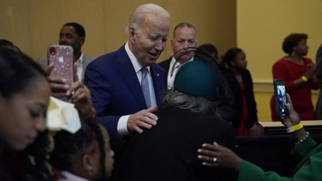 Joe Biden works the room at the Brookland Baptist Banquet Centre in West Columbia, South Carolina, on Sunday. Picture: AFP