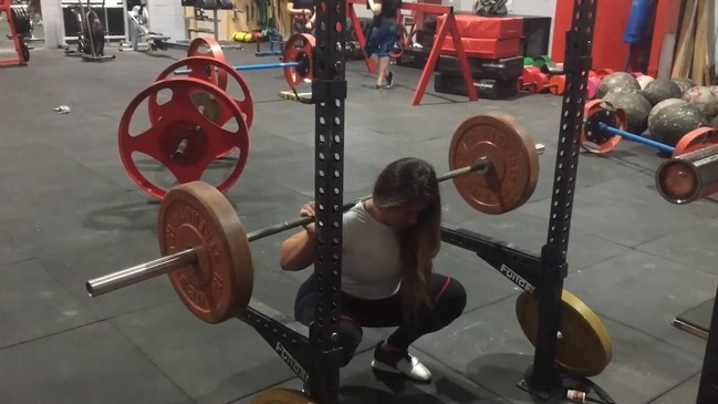 Gold Coast strongmen and strongwoman