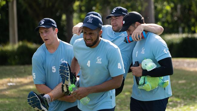 'Storm player Tepai Moeroa being carried by teammates. Picture: Supplied.