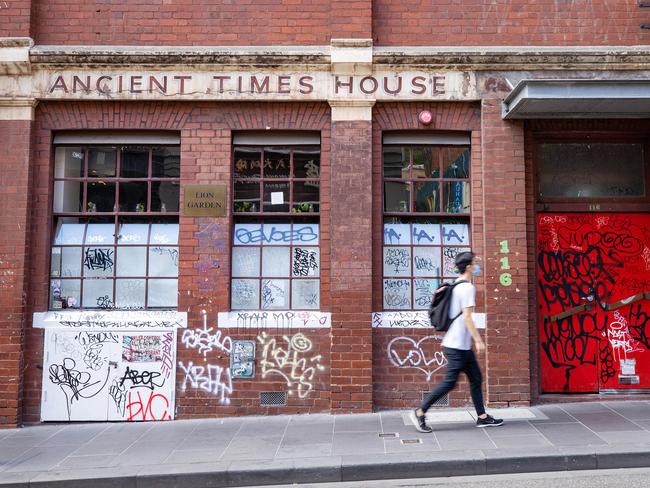 A building in Little Bourke Street covered in graffiti. Picture: Mark Stewart