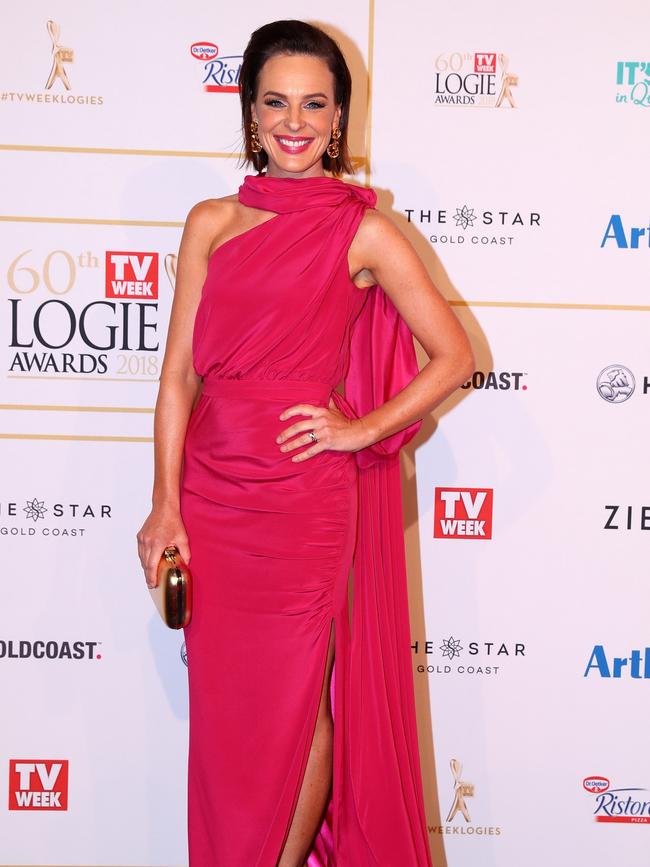 News presenter Natarsha Belling adds a pop of pink to the red carpet in this head-turning number. Picture: Chris Hyde/Getty Images