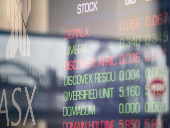 SYDNEY, AUSTRALIA - NewsWire Photos September 27, 2021: Information boards seen through the windows at the Australian Securities Exchange, Sydney. Picture: NCA NewsWire / James Gourley