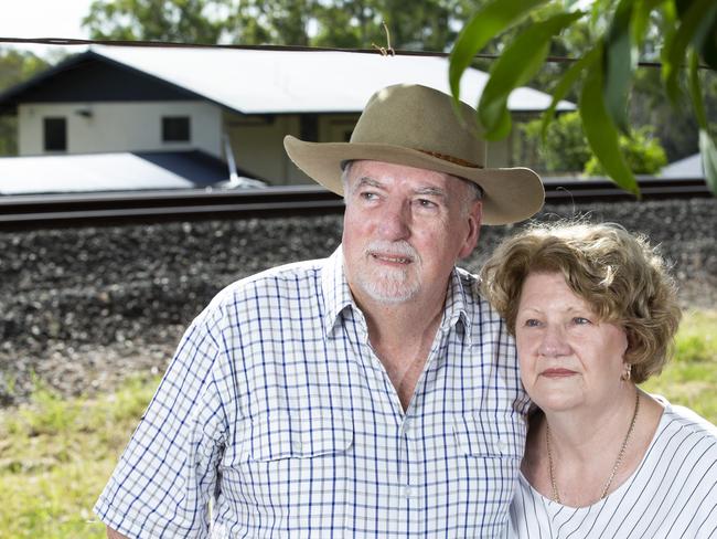 Stan and Suz Corbett have been campaigning against the Inland Rail for many years. Thursday, March 19, 2020. Stan and Suz pose for a photograph next to the Hillcrest/Forestdale corridor. (AAP Image/Renae Droop)