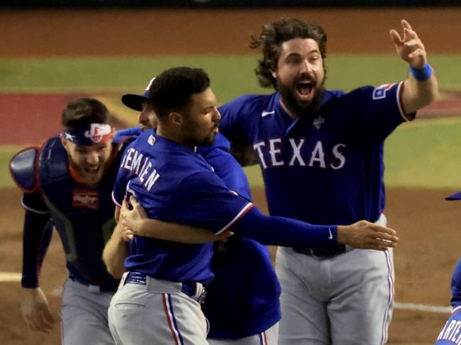 PHOENIX, ARIZONA - NOVEMBER 01: The Texas Rangers celebrate after beating the Arizona Diamondbacks 5-0 in Game Five to win the World Series at Chase Field on November 01, 2023 in Phoenix, Arizona. (Photo by Sean M. Haffey/Getty Images) *** BESTPIX ***