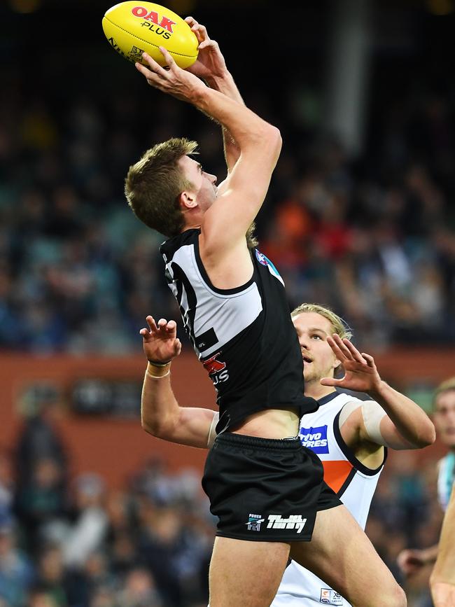 Power’s  Dougal Howard marks against the Greater Western Sydney Giants at Adelaide Oval. Picture: Mark Brake/Getty