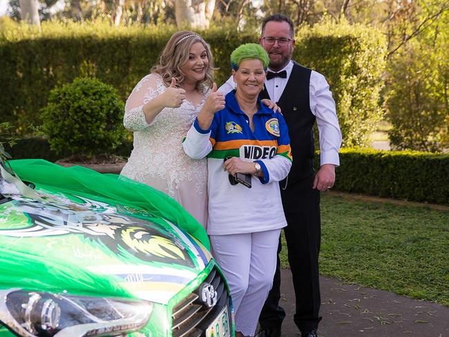 Sue Washington, owner of the Green Machine, with newlyweds Dan and Jacqui Hewitt