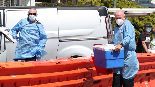 QML Labs forced to exchange samples over the Border Wall. Picture Glenn Hampson