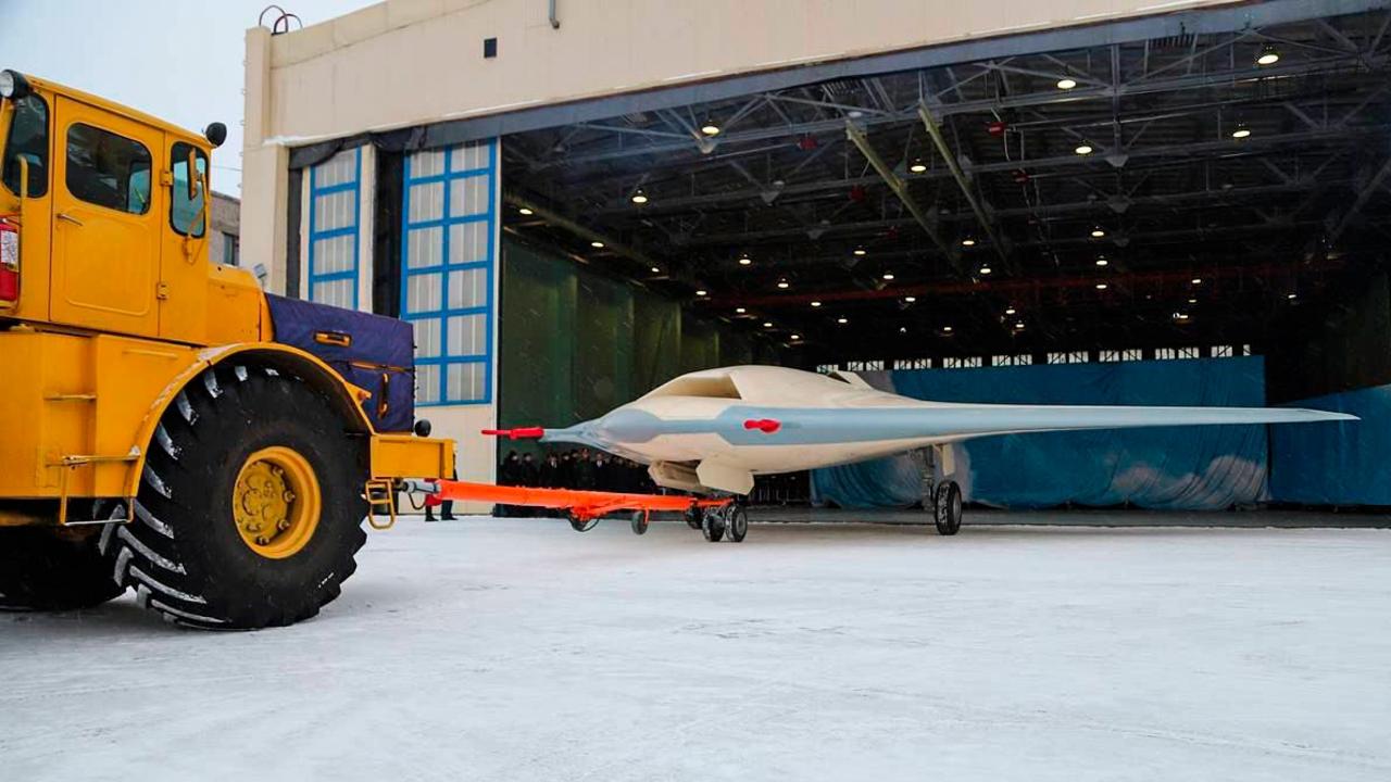 Rolling out the first flight prototype of the Sukhoi S-70 Okhotnik [Hunter] combat drone at the Chkalov Novosibirsk Aviation Plant. The unmanned combat aerial vehicle has been developed by Sukhoi using the flying wing design and the stealth technology which reduces its radar signature. Picture: Getty