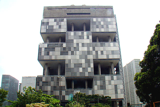 <p><strong>6. PETROBRAS HEADQUARTERS, RIO DE JANEIRO, BRAZIL.</strong> A cross between a penitentiary and an unfinished Lego creation is one member's description of this dreary, block-like structure which occupies a prominent place in the city's downtown area. To make matters worse, exterior slats give the illusion that the building is actually falling apart / Flickr user Rodrigo Soldon</p>