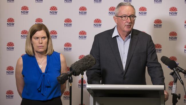 Health Minister Brad Hazzard and NSW Chief Health Officer Dr Kerry Chant on Saturday night. Picture: Damian Shaw