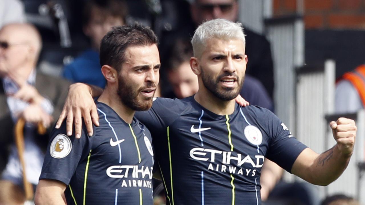 Manchester City's Sergio Aguero celebrates with teammate Bernardo Silva