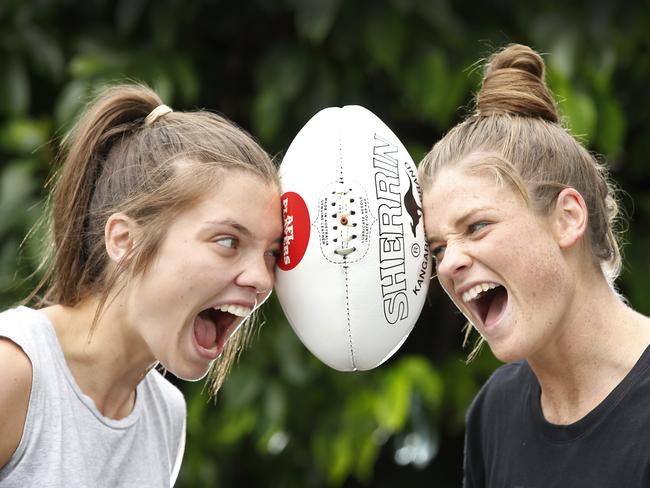 AFLW players Ellie Blackburn for Western Bulldogs and Brianna Davey Carlton being the tough nuts of the women's league. Picture: David Caird