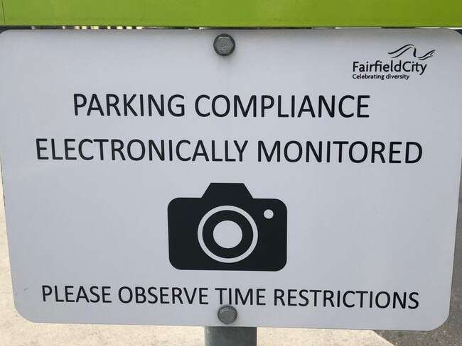 Fairfield City Council carparks display signage warning drivers that cameras are used to monitor timed parking, such as the parking compliance vehicle.