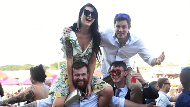 LR: Mimie Pollock, Scott Riley with fellow larkins at the Darwin Cup 2022. Picture: (A)manda Parkinson