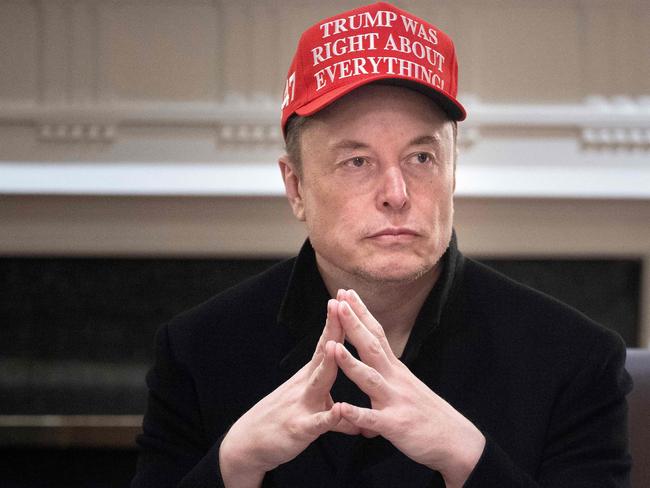 TOPSHOT - Elon Musk looks on during a Cabinet Meeting in the Cabinet Room of the White House March 24, 2025 in Washington, DC. (Photo by Brendan Smialowski / AFP)