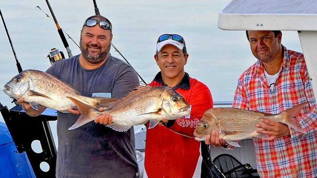 Gotcha - Chicko Vella from Davo's Tackle World and a couple of mates got into the snapper in close off Noosa. Picture: www.fishingnoosa.com.au