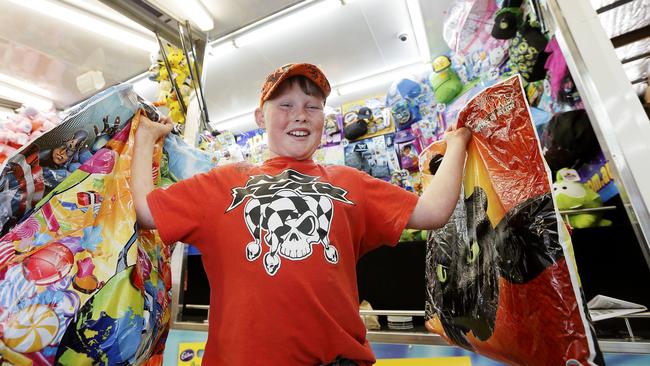 Danny Whitbread, 12, from Tunnack, with some of the showbags on offer. Pictures: RICHARD JUPE