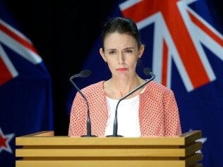 WELLINGTON, NEW ZEALAND - JANUARY 23: Prime Minister Jacinda Ardern looks on during a press conference at Parliament on January 23, 2022 in Wellington, New Zealand. Prime Minister Jacinda Ardern announced that New Zealand will be moving to the red traffic light setting at 11.59pm tonight after nine cases reported in Nelson/ Marlborough region were discovered to have the Omicron variant. (Photo by Hagen Hopkins/Getty Images)