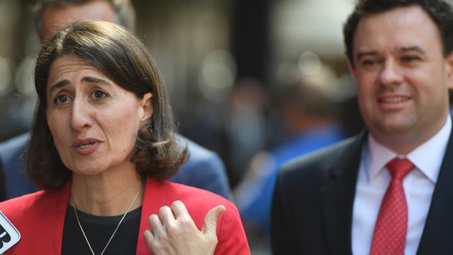 Premier Gladys Berejiklian and NSW Minister for Sport Stuart Ayres address the media in Sydney. Picture: AAP Image/Dean Lewins