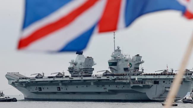 HMS Queen Elizabeth aircraft carrier leaves Portsmouth Naval Base on the south coast of England to take part in exercises off Scotland before heading to the Indo-Pacific region.