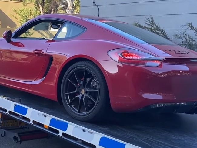 A red Porsche towed away after a big drug bust in Melbourne's southeast.