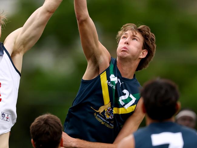 MELBOURNE, AUSTRALIA - APRIL 27: Liam Podhajski of Coburg and Taj Murray of the AFL National Academy compete in the ruck during the Marsh AFL National Academy Boys match between Australia U18 and Coburg VFL at Whitten Oval on April 27, 2025 in Melbourne, Australia. (Photo by Josh Chadwick/AFL Photos/via Getty Images)