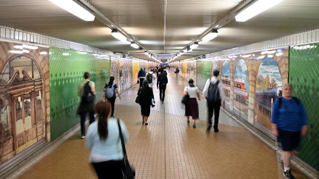 Pedestrians pass through Central Station in Sydney yesterday. Picture: AAP