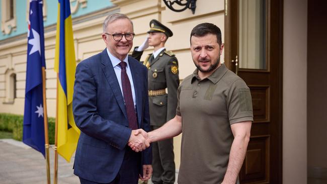 Ukrainian President Volodymyr Zelensky (R) and Australia's Prime Minister Anthony Albanese (L) shaking hands prior to a meeting in Kyiv. Picture: Ukrainian presidential press service / AFP