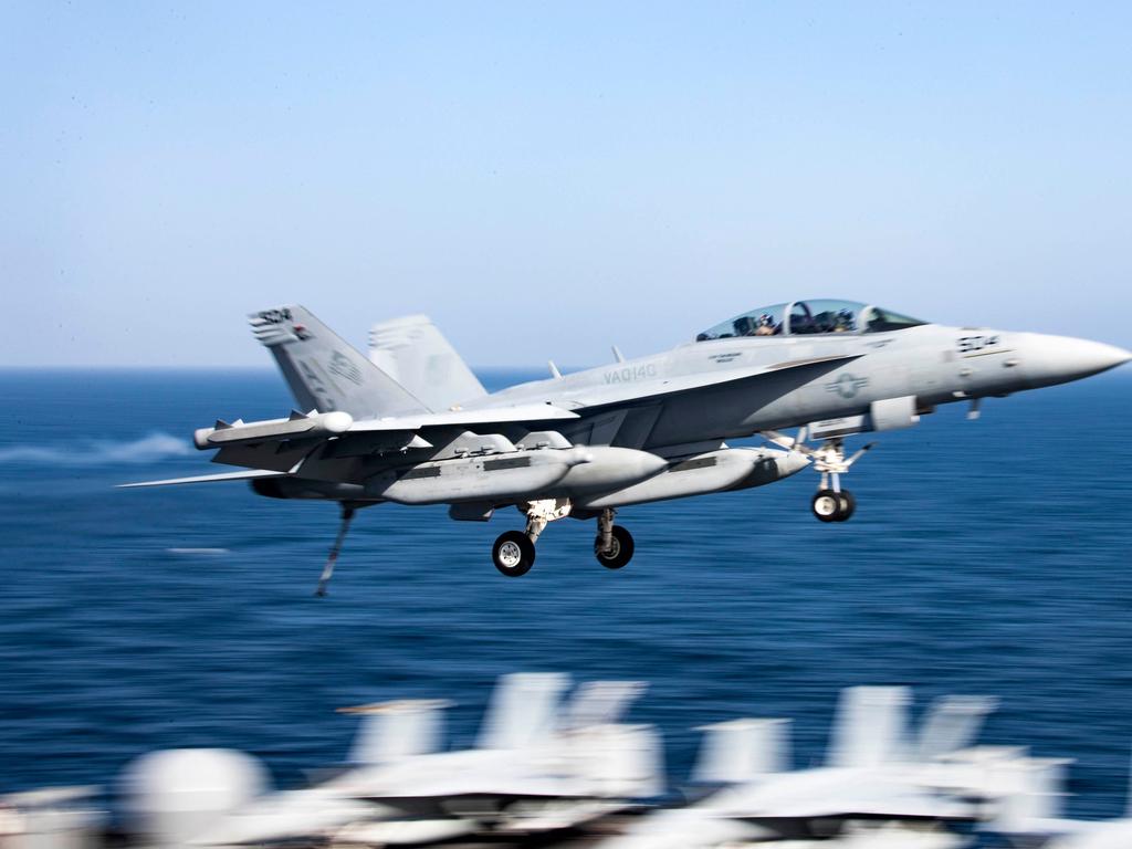 An F/A-18F Super Hornet pilot claims he nearly collided with a UFO. Picture: AFP