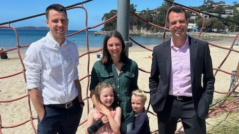 Labor's Josh Willie with Caitlin Saunders and her children Lily and Luke and Labor candidate Kaspar Deane at Kingston Beach on Wednesday, February 7, 2024.