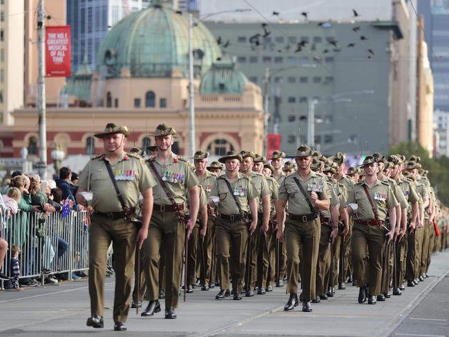 Thousands of people lined the march route. Picture: Alex Coppel